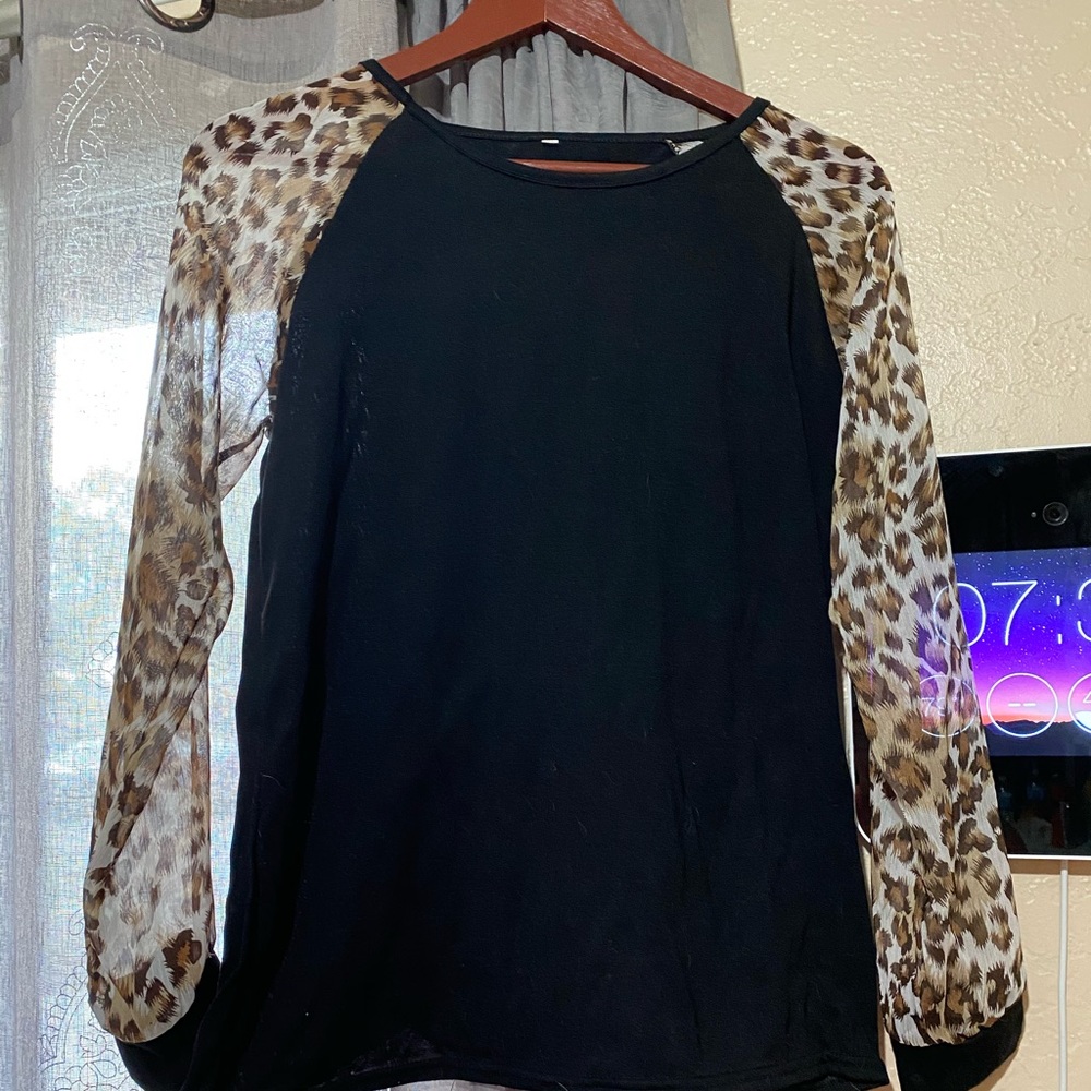 Summer Sale 3 for $10 Leopard and black blouse.